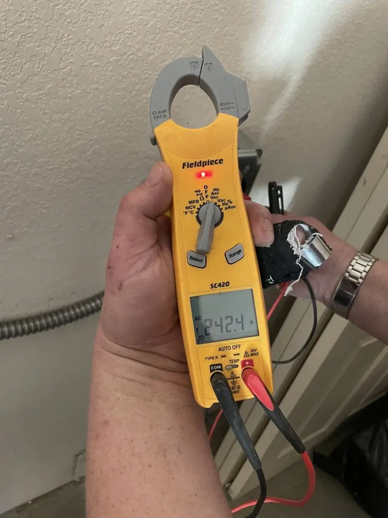 Voltage testing with clamp meter during Hot Tub / Pool Electrical Wiring in Cache